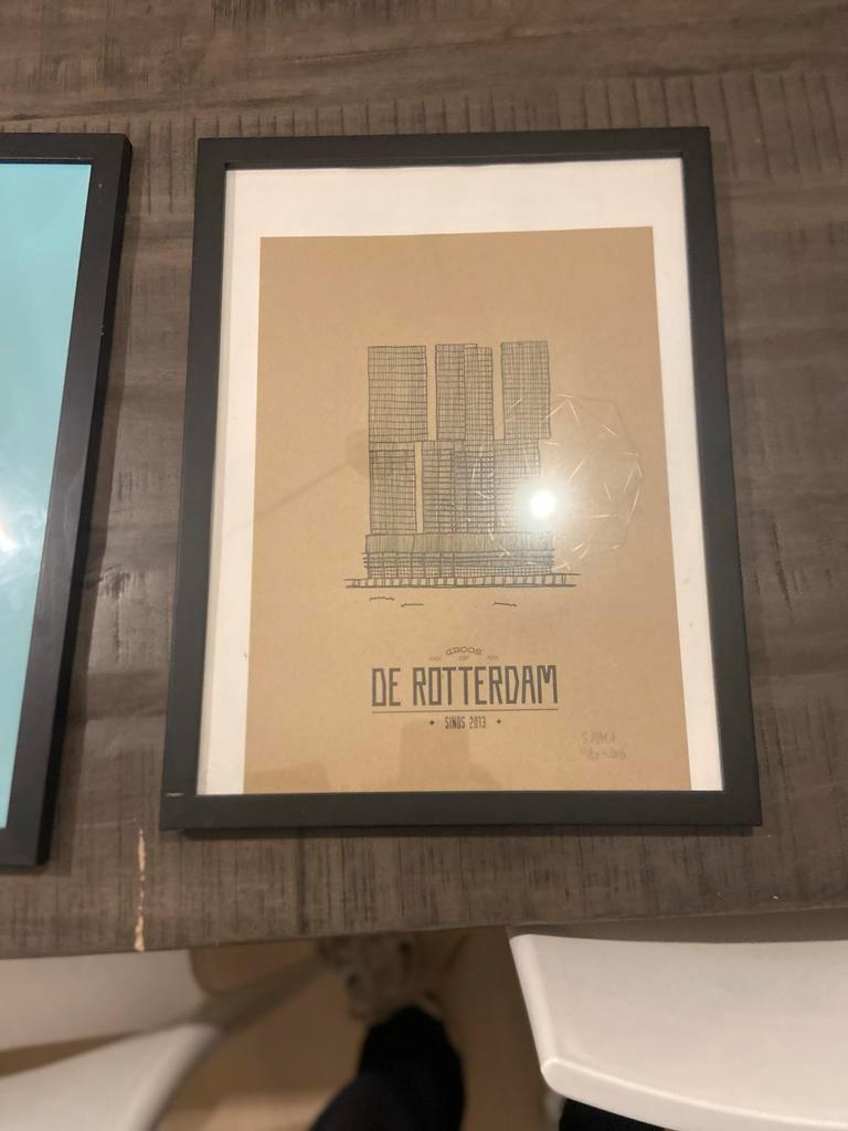 Drie ingelijste kunstwerken