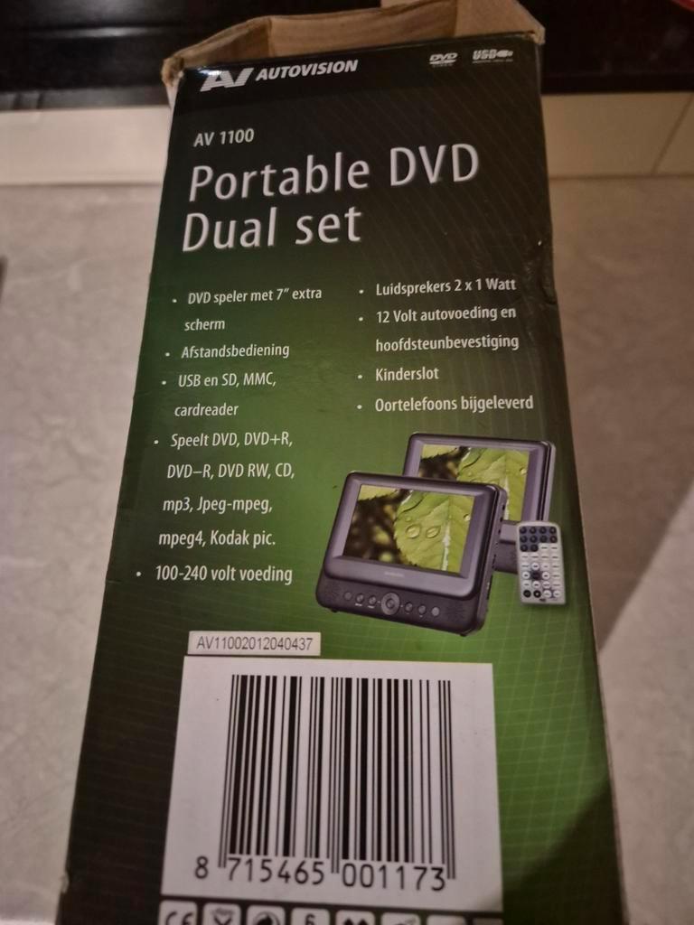 Gratis: DVD Speler Dual Set voor Auto - AV 1100