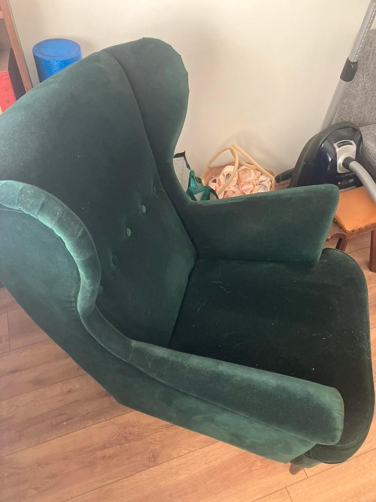 Donkergroene oor fauteuil