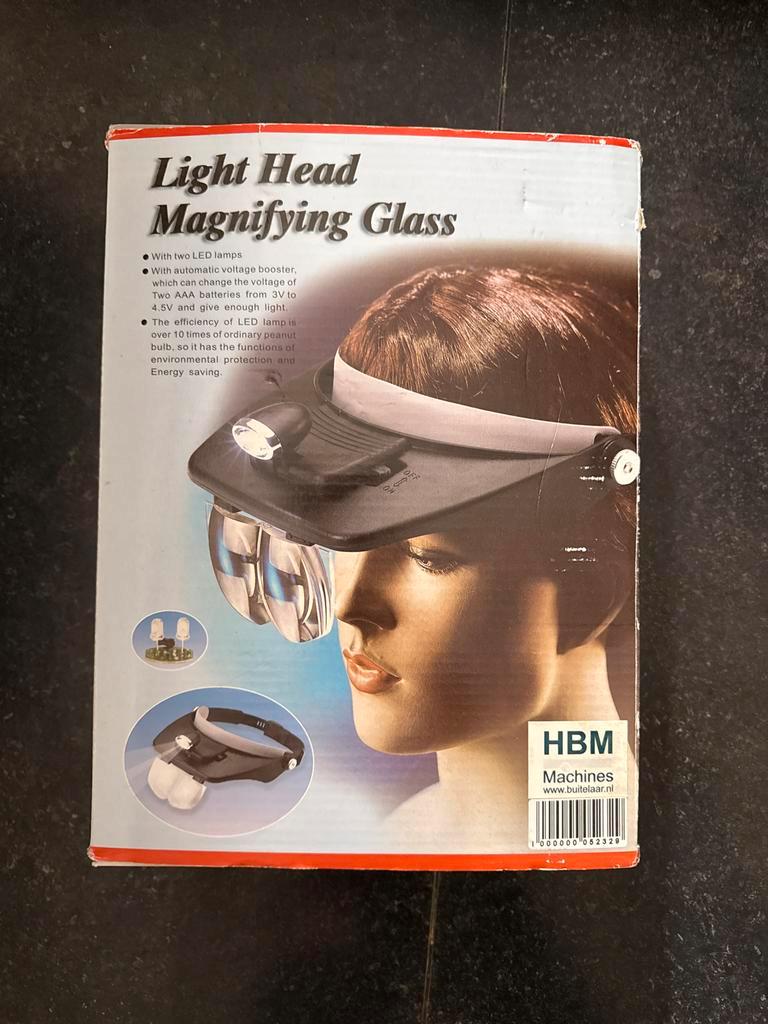 Hoofdlamp met vergrootglas en LED verlichting
