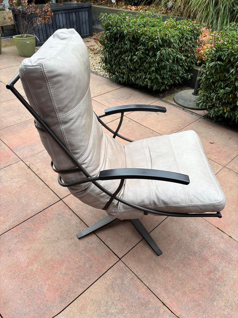 Industriële draaistoel met poef van ''t Anker