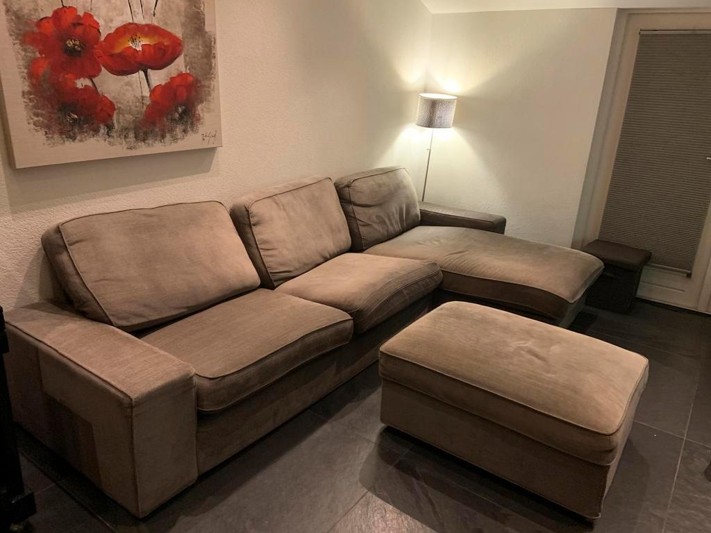 Hoekbank met chaise longue en hocker