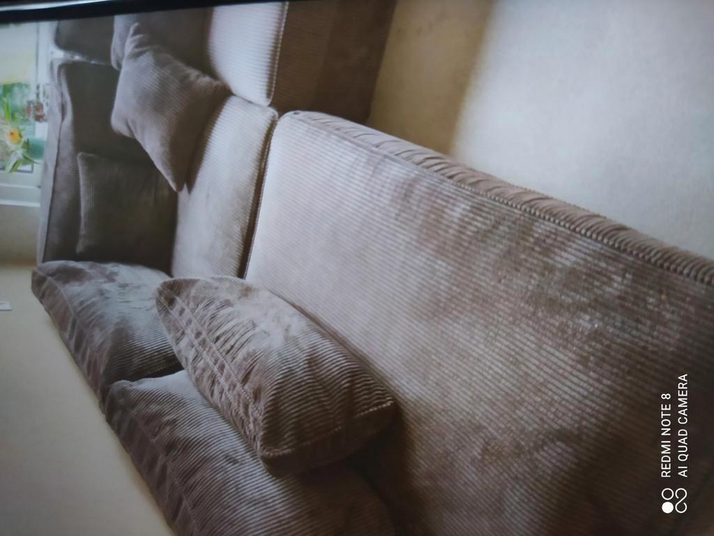 Mooie hoekbank 1 jaar oud