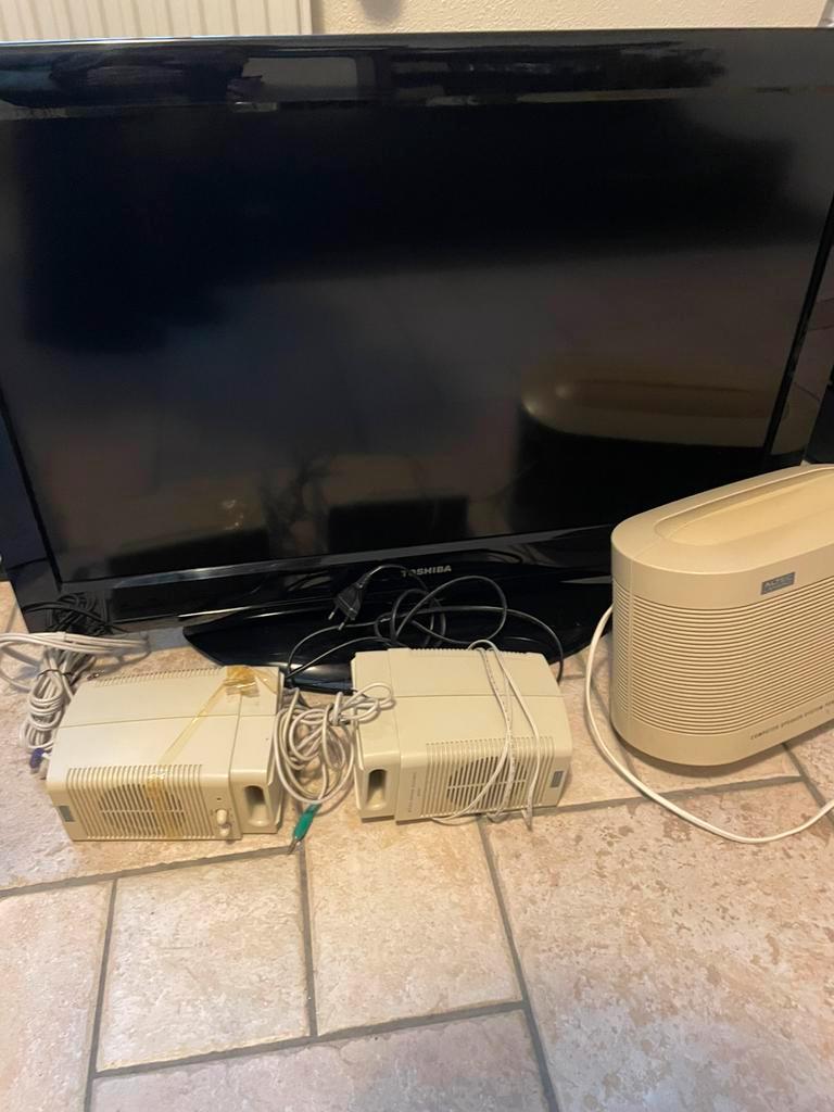 Tv + gratis speakers en woofer