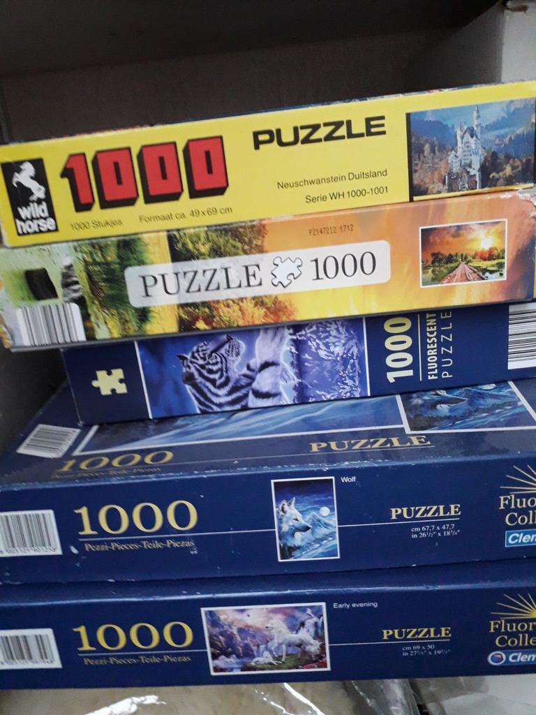 5 puzzels van 1000 stukjes