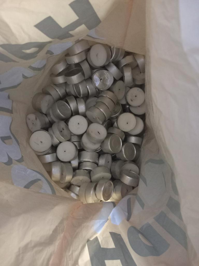 Gratis zak vol met veel waxinelichtjes