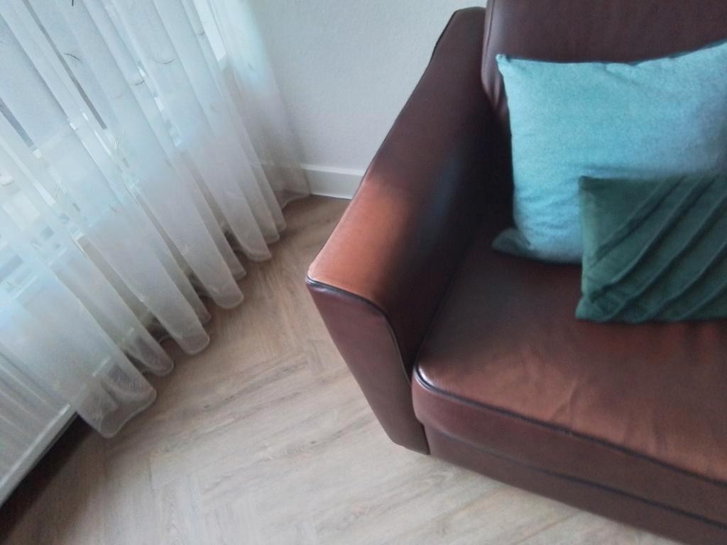 Bank bruin leer 3 persoons