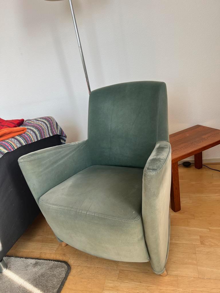 Comfortabele groene fauteuil