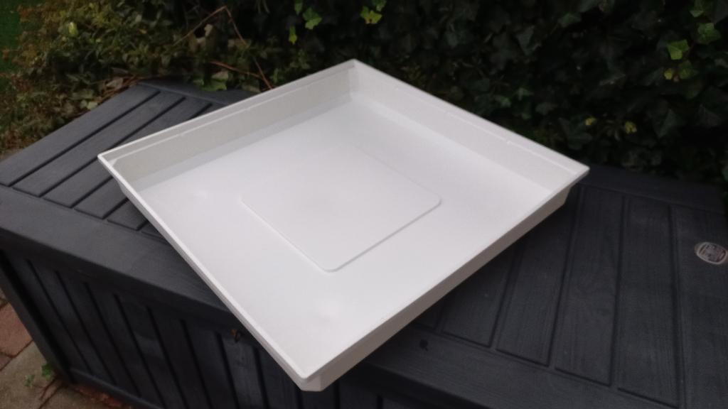 Lekbak voor een wasmachine