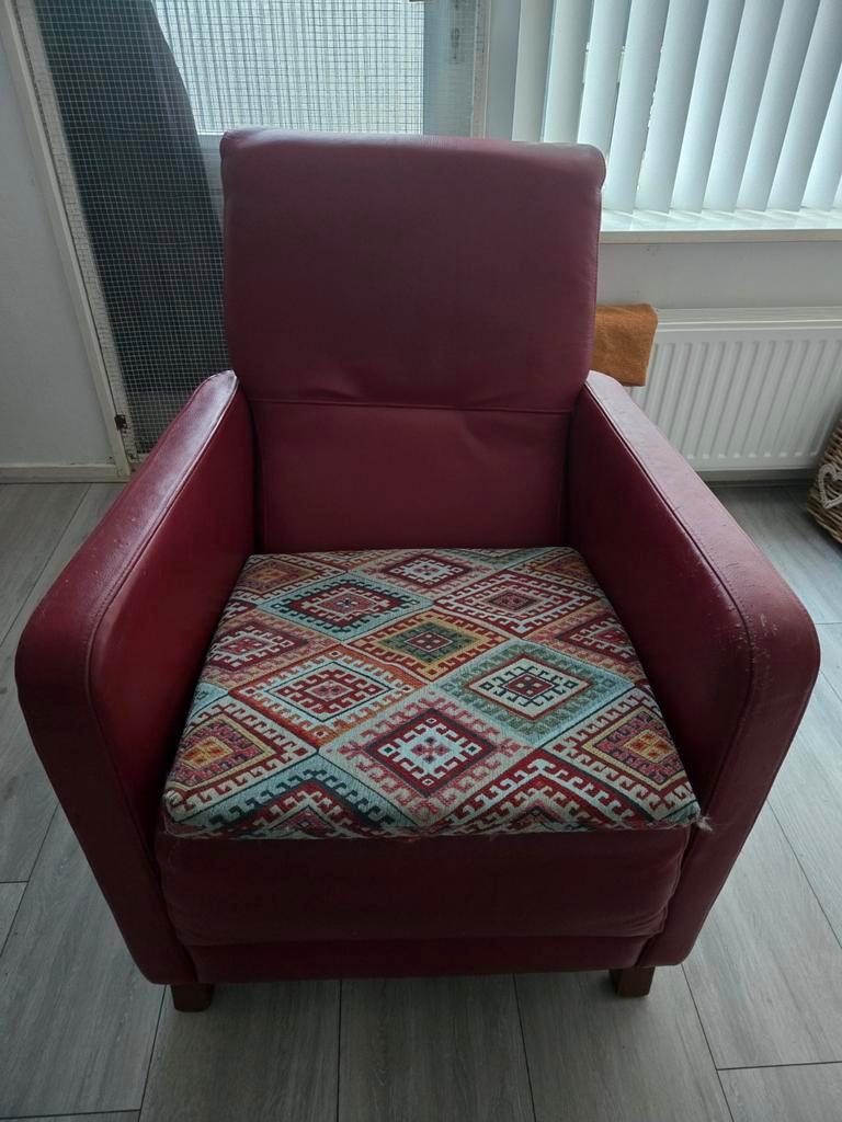 Fauteuil met kussen.