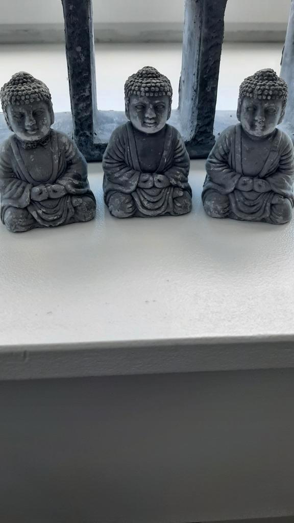 Waxinelichthouder met Boeddhabeeldjes