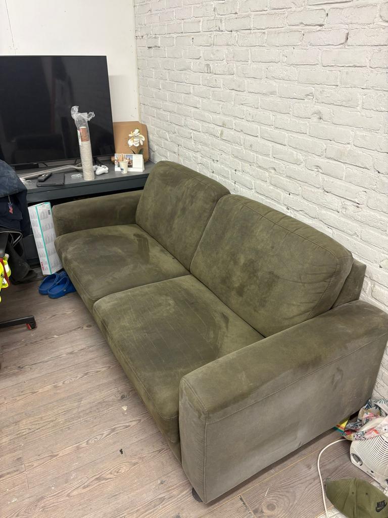 Groene leren bank in nette staat