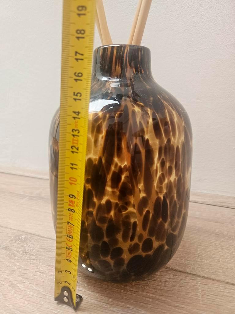 Leuk vaasje met pluimen