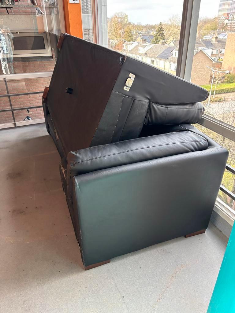 Zwarte lederen hoekbank - Gebruikt