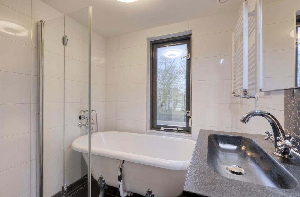 GRATIS! Vrijstaande badkuip met badkraan