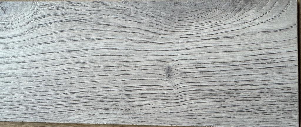 Lichtgrijs click laminaat, op te halen vanaf 4 maart.